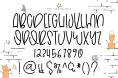 a handwritten alphabet with cats and owls on it