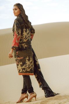 This summer, the new festive collection has been set up with new Pakistani printed lawn outfits to give you a cool lavish look in this hot season. You can buy fresh seasonal wear online to adorn your summer look in an elegant way. Shirt: This lawn attire is showing its grace with black color printed front and back panels for shirt. Printed doria lawn shirt is over digitally printed with beautiful flower prints. Sleeves are also beautifully printed in elegant patterns. Trouser: Black color cambri Hot Season, Pakistani Designer Suits, Sana Safinaz, Lawn Dress, Festive Collection, Lawn Suits, Pakistani Designers, Ladies Dress Design, Designer Suits