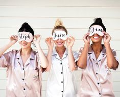 three women are holding up their faces with the words stop and june painted on them