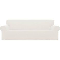 a white couch sitting on top of a white floor