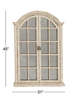 the measurements for an arched window with mesh panels on each side, and two doors at the top