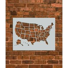 a map of the united states on a brick wall