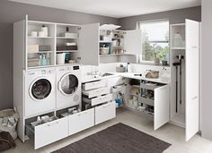 a washer and dryer in a small room