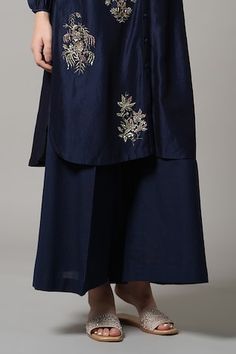 Blue chanderi kurta with placed sequin and bead embroidered floral bouquet motifs. Comes with pant. - Aza Fashions Traditional Floral Embellished Sets For Designer Wear, Festive Embroidered Blue Bottoms, Blue Embellished Raw Silk Sets, Embellished Blue Raw Silk Set, Traditional Embellished Pants For Festive Occasions, Traditional Festive Embellished Pants, Festive Blue Embroidered Pants, Festive Traditional Embellished Pants, Festive Embroidered Blue Pants