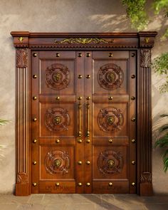 a large wooden door with ornate carvings on it