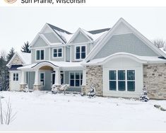 a large house with snow on the ground