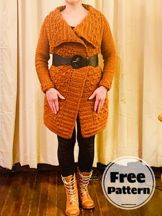 a woman standing in front of a curtain with her hands on her hips and wearing boots