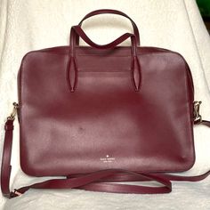 Kate Spade Universal Laptop Bag, Burgundy, Short Handles, Long Crossbody Strap, 3 Sections, Credit Card Slots, Pen Slots, Interior Zip Pocket, Lightly Used, Small Dent Shown In Pic Kate Spade Business Top Handle Bag, Kate Spade Business Tote Shoulder Bag, Office Bags With Detachable Strap In Burgundy, Red Business Bag With Adjustable Strap, Business Bags In Burgundy With Detachable Strap, Burgundy Satchel With Adjustable Strap For Formal Occasions, Burgundy Office Bag With Detachable Strap, Burgundy Office Bags With Detachable Strap, Business Burgundy Bags With Detachable Strap