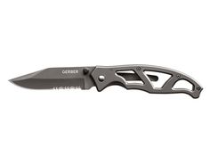 a knife that is sitting on top of a white surface with the words gerber written on it