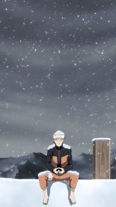 a man sitting on top of a snow covered ground next to a wooden post in front of a night sky