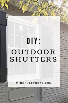 the words diy outdoor shutters are in front of a white house with black shutters