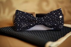 "Now you can create your own bow with these white self-tie bow ties. Can be worn tied or untied. An adjustable neck allows you to fit the bow to your neck size. Product Features * Bow measures approximately 5\" across and 2.5\" high on the ends * Adjustable for neck sizes approximately 15\" to 18\" * Made from 100% Polyester * Light satin finish Ties are custom printed. Each tie is unique - no two ties are exactly alike. Image will vary from what is shown." Fitted Bow Tie As A Gift, Fitted Bow Tie As Gift, Adjustable White Bow For Black Tie Occasion, Pre-tied Butterfly Knot Bow As Gift, Pre-tied Bow Tie With Butterfly Knot As Gift, Pre-tied Butterfly Knot Bow Tie Gift, Pre-tied Bow With Bow Tie Back For Gifts, Star Constellations, Tie Accessories