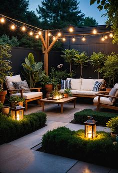 an outdoor patio with lights strung over the seating area and potted plants on either side