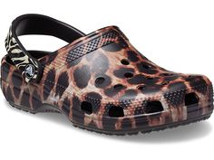 Crocs Classic Animal Print Clog - Shoes : Black/Multi Animal Remix : You will be wildly comfortable in the posh Crocs Classic Animal Print Clog. Thermoplastic (EVA) foam construction makes them incredibly light. Easy slip-on with adjustable back strap. Extra roomy for a comfortable fit. Ventilation system that allows air and water to pass through multiple ports inside of shoe. Iconic Crocs Comfort: original foam cushioned footbed. Thermoplastic (EVA) outsole. Imported. Measurements: Weight: 6 oz Matching Crocs, Crocs Ideas, Saltwater Sandals, Leopard Shoes, Crocs Clogs, High Heel Slippers, Crocs Classic Clogs, Muck Boots, Women's Crocs