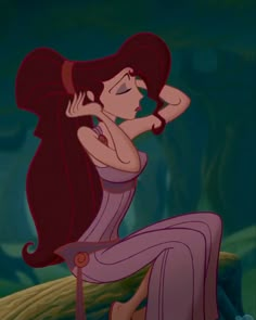 ariel from the little mermaid sitting on a rock with her hair blowing in the wind