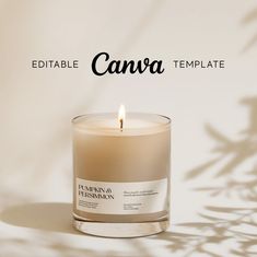 a candle that is sitting in front of a wall with the words canva on it