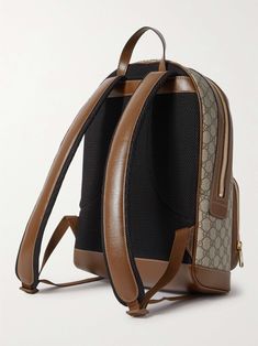 Designer Coated Canvas Backpack For Business, Designer Business Backpack In Coated Canvas, Gucci Standard Everyday Backpack, Brown Gucci Standard Backpack, Gucci Brown Standard Backpack, Gucci Brown Backpack For Daily Use, Luxury Coated Canvas Backpack For Everyday, Designer Leather Travel Backpack, Designer Backpack With Leather Trim For Daily Use