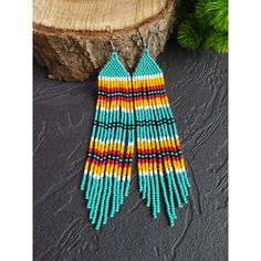 Festival Turquoise Tassel Earrings With Colorful Beads, Turquoise Tassel Earrings With Colorful Beads For Festival, Turquoise Beaded Tassel Earrings For Festival, Turquoise Fringe Beaded Drop Earrings, Turquoise Beaded Fringe Drop Earrings, Turquoise Beaded Fringe Tassel Earrings For Festival, Festival Turquoise Beaded Fringe Earrings, Turquoise Fringe Beaded Earrings For Festival, Turquoise Beaded Fringe Dangle Tassel Earrings