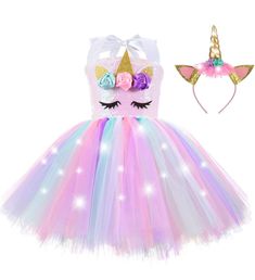 PRICES MAY VARY. Novel unicorn lighted outfits, every girl will be a beautiful princess! package including 1 lighted tutu dress(There is a cotton skirt lining under the tulle pieces section, more comfortable to wear) + 1 lighted unicorn headband. MATERIAL: High quality sequin, shiny and not easy to fall off. Top lined with a silk like fabric, very soft and comfortable, 100% polyester. Colorful tulle strips, vibrant color and looks very fluffy, 100% nylon. There is a cotton skirt lining under the Princess Tutu Costumes, Unicorn Dresses, Flower Birthday Party, Girl Birthday Decorations, Unicorn Costume, Unicorn Dress, Christmas Party Outfit, Unicorn Headband, Princess Tutu