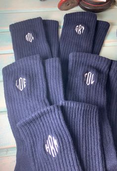 "NKDs offering: BOY'S Black or Navy Monogrammed Cotton & poly-blend FLAT/ Ribbed Top School/CasualDress Socks  Are these a must-have? Here I have \"a pair\" of very classy black or Navy boy's monogrammed socks.  They have a very wonderful monogram in the color and font of your choice. →For boys →Monograms can be one or both socks. 1 pair of WHITE or BLACK Rolled cuff Socks Size fits most: (can be stitched on rolled cuff or top rolled out) AGE (approx) 0-6 months 6-18 months 1 pair of NAVY, TAN, Hope Embroidery, Monogramming Ideas, Top School, Boy Monogram, Bride Headband, Embroidered Initials, Boys Socks, School Tops, S Monogram