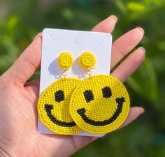 Perfect statement earrings for the summer! 😊Smiley face/happy face earrings will bring smiles to everyone that's around you! 💥Message me for bulk orders They come in a gift pouch so they are great for gifts too! These are all made and ready to ship! 🌟Please leave a message if you need clip-on 🌟All orders placed before 2pm PST will be shipped on the Same day 🌟Delivered by first class. If you need the order in 2-3 days, please upgrade your shipping service! 🌟Please double check your address Fun Beaded Earrings For Summer Gifts, Handmade Beaded Earrings For Everyday Summer Wear, Trendy Handmade Yellow Beaded Earrings, Cute Smiley Face Earrings For Gift, Trendy Yellow Beaded Earrings - Gift Idea, Trendy Yellow Beaded Earrings As Gift, Trendy Yellow Beaded Earrings For Gift, Fun Smiley Face Jewelry For Summer, Fun Summer Jewelry With Smiley Face