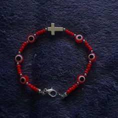 Brand New Super Cute Red With Silver Trimmings And Cross Evil Eye Bracelet With No Stretch. Fits Most! I’m 5”4 Weight 162 (Just So You Can Get An Idea On The Fit). Any Questions Please Ask Before Purchasing Thank You Evil Eye Bracelet Red, Evil Eye Beaded Bracelet, Eye Bracelet, Evil Eye Bracelet, Evil Eye, Beaded Bracelet, Super Cute, Beaded Bracelets, Women Accessories