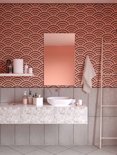 a bathroom with two sinks and a mirror on the wall next to a towel rack