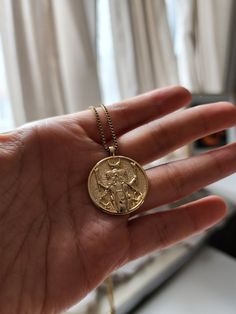 Description: - Chain Length is approximately 45cm.  - Coin Pendant is 0.95 inch or 2.4cm in diameter.  - Material: Gold Filled Returns and Refunds: - Refunds and Cancellations within 24 hours of purchase. - All Returns and Exchanges within 30 days of purchase.  Shipping: - Free shipping via USPS Ground across anywhere in the US. - Due to our items being all custom made to order please allow 3-5 days for handling and processing not including shipping time. Tracking information will be updated as soon as item is ready to be shipped. About Us: - We are a small business located in NY that loves making punk and gothic themed gold  jewelry and accessories with dainty and minimalist styles. We greatly appreciate each and every sale and support. Tarnish Resistant Brass Wedding Necklace, Tarnish Resistant Round Pendant Charm Necklaces For Weddings, Spiritual Medallion Necklace For Wedding, Symbolic Round Pendant Jewelry For Weddings, Tarnish Resistant Round Pendant Charm Necklace For Wedding, Tarnish Resistant Medallion Jewelry For Weddings, Wedding Tarnish Resistant Round Pendant Charm Necklace, Amulet Style Round Pendant Necklace For Wedding, Symbolic Medallion Necklace For Weddings