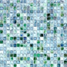 a mosaic tile wall with green and blue tiles