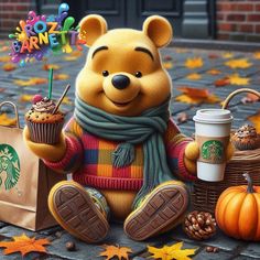 a teddy bear sitting on the ground with starbucks coffee and cupcakes