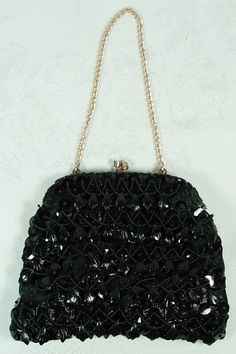 THE 5 1/2" X 6 1/2" PURSE IS IN NICE CONDITION, METAL CLASP AND CHAIN HANDLE. PLEASE VISIT OUR EBAY STORE FOR MORE ANTIQUE & COLLECTIBLE ITEMS. Powered by SixBit's eCommerce Solution Handmade Black Handheld Evening Bag, Handmade Black Clutch Evening Bag, Black Beaded Pouch Clutch, Black Beaded Rectangular Clutch, Handmade Black Evening Bag For Events, Handmade Black Evening Bag, Black Rectangular Evening Bag With Black Beads, Black Beaded Rectangular Evening Bag, Black Embellished Pouch Evening Bag