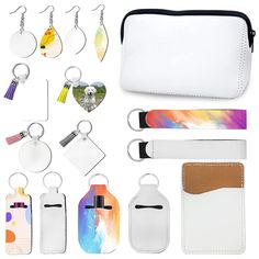 the contents of a white leather case are shown with key chains, tags, and other items