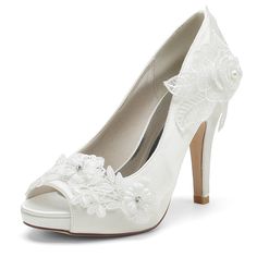 a white high heeled shoe with flowers on the side