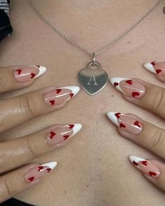 White Almond Nails With Red Heart, Dark Red Nails With Heart Design, Valentine’s Day Nail Inspo Almond Shape, Valentines Nails Almond Shape Red, Red Heart Almond Nails, Almond Nails With Red Hearts, Xo Valentine Nails, Almond Nails Designs Valentines Day, Nude Nails With Red Heart