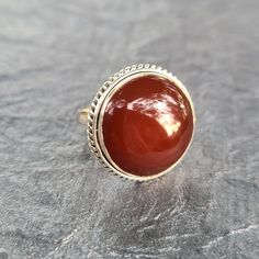 Red Onyx Ring Sterling Silver-Chunky Onyx Ring Size 9-Silver Ring Material: Onyx, Sterling Silver Dimension: 2.5 Cm New Without Tag Red Nickel Free Rings, Classic Adjustable Red Ring, Red Sterling Silver Crystal Ring, Silver Carnelian Rings With Polished Finish, Silver Rings With Polished Carnelian, Red Cabochon Round Stone Jewelry, Nickel-free Red Ring Jewelry, Adjustable Red Cabochon Jewelry, Red Sterling Silver Jewelry With Large Stone