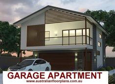 a car is parked in front of a two story house with the words garage apartment above it