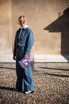 MILAN, ITALY - FEBRUARY 22: Xenia Adonts, wearing a purple Maison Margiela bag and denim jacket and pants, is seen outside Etro on Day 3 Milan Fashion Week Autumn/Winter 2019/20 on February 22, 2019 in Milan, Italy. (Photo by Claudio Lavenia/Getty Images) Margiela Bag, Xenia Adonts, Womens Boyfriend Jeans