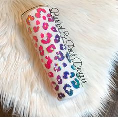 the colorful leopard print on this tumbler is perfect for any girl in her life