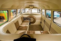 the interior of an old bus with several windows