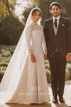 the bride and groom are posing for a photo