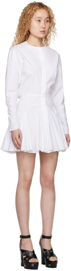 Paneled cotton poplin dress. · Band collar · Concealed button closure · Seam pockets · Flared hem · Dolman sleeves · Seven-button surgeon's cuffs · Gathering at back Supplier color: White Cotton Poplin Dress, Poplin Dress, Band Collar, White Brand, Leather Pouch, Dolman Sleeve, Cotton Poplin, Stiletto Heel, Calf Skin