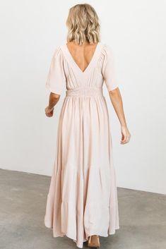 Say "Hello!" to the boho dress of your dreams! High quality, knit material Deep v neckline in front and back of dress Lined to mid thigh Two tiered full skirt Smocked waist Bump and nursing friendly Bump friendly up to 29 weeks, we recommend sizing up after 29 weeks 100% rayon Trina is 5’6”, 32D cup, size 2 and wearing size small. Angela is 5’6, 32D cup, size 6 and wearing size small. Sage Dress, Baltic Born, Nursing Friendly, Dress Dusty, Cup Size, Full Skirt, Stunning Dresses, Elegant Dress, Teen Fashion