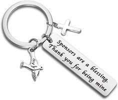 a keychain with a cross on it that says, sons are blessing you for being mine