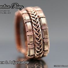 the ring is made from copper wire and has an intricate design on it's side