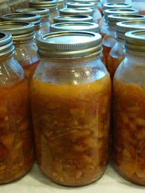 several jars filled with food sitting on top of a table