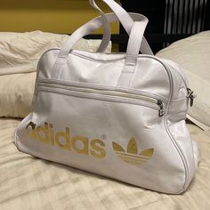 Adidas Faux Leather White And Gold Handle Bag. Smaller Bag And A Little Lean. Minor Blemishes Here And There. Adidas Bags, Adidas White, Duffel Bags, Gold Handles, White Adidas, Handle Bag, Black Backpack, Duffel Bag, Small Bag