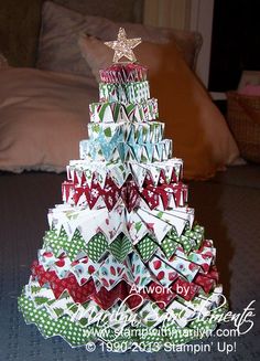 a christmas tree made out of folded paper