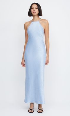 Designed in a classic halter shape, the BEC + BRIDGE Lani Halter Maxi Dress features a slightly dropped waist and outside binding on armholes and neckline that carries through to back straps connected by hook and ball closure. The dress is complemented with a low-cut back and a sweet keyhole opening. This garment is certified Australian made. Grace Wedding Dress, Ice Blue Dress, Pale Blue Dress, Blue Halter Dress, Dress Code Wedding, Ice Dresses, Bec Bridge, Cowl Neck Dress, Halter Maxi Dress