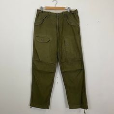 [DESCRIPTION] Please read the description first before buy my items‼️‼️‼️ Vtg John Bull Tactical Multipocket Utility Cargo Rare Pants All in good condition [MATERIAL] Cutton [MEASUREMENT] Measurement ( WHEN LAID FLAT ): Waist: 33 inch (recommended) Insean: 30.5 inch Length: 40.5 inch Front Rise: 11 inch Thigh: 22 inch Opening Leg: 16 inch [CONDITION] - All in good condition  - Have pinhole [PAYMENT & NOTICE] - We accept PayPal ONLY - No return/refund - All items will be post over shipping compan Combat Cargo Pants With Pockets, Combat Style Full-length Cargo Pants, Khaki Combat Bottoms With Multiple Pockets, Khaki Full-length Utility Parachute Pants, Full Length Combat Cargo Pants, Military Style Full-length Parachute Pants With Multiple Pockets, Military Full-length Parachute Pants With Multiple Pockets, Military Full-length Parachute Pants With Pockets, Military Style Full-length Parachute Pants With Pockets