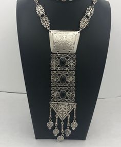 354.00 USD Huge vintage necklace in good condition. Chain measures 29 in long and the pendant measures 8 by 2 inches Very nice addition to any collectible mid century collection. For more purses.... https://www.etsy.com/shop/MartiniMermaid?ref=listing-shop2-all-items-count§ion_id=8097288 For more bracelets ...... https://www.etsy.com/shop/MartiniMermaid?ref=hdr_shop_menu§ion_id=8097311 For more vintage necklaces.... http://etsy.me/1RY2UxM For more jewelry sets..... http://etsy.me/1NxsRaY For… September Style, Vintage Necklaces, Red Rhinestone, Vintage Vogue, Pendant Silver, Jewellery Designs, Rhinestone Necklace, Glass Necklace, Metal Jewelry